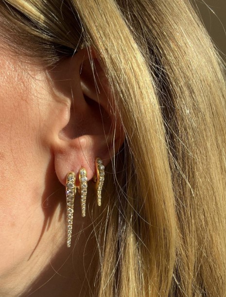 Diamond Lola Needle Anita Ko Earrings stacked on an ear