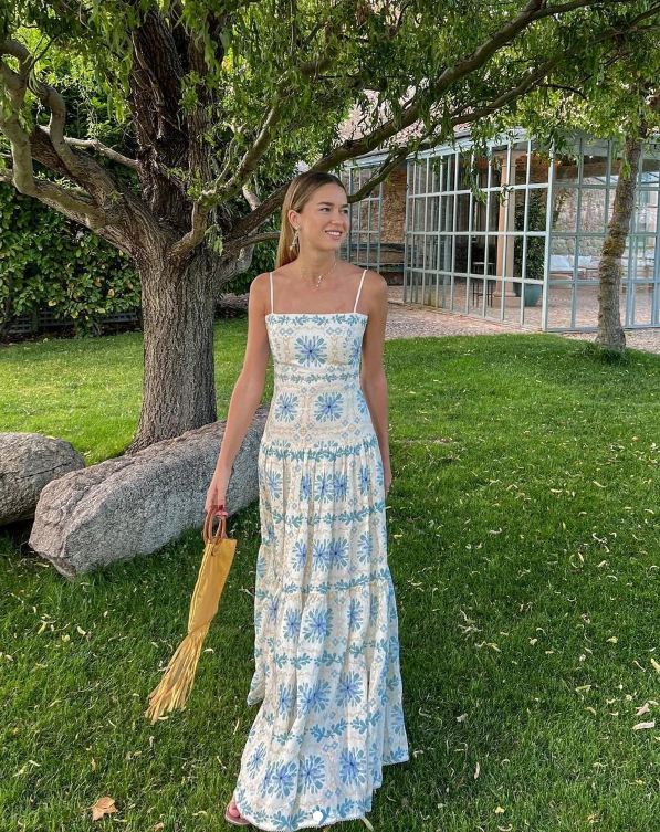 Agua by Agua Bendita Dress being worn in a garden