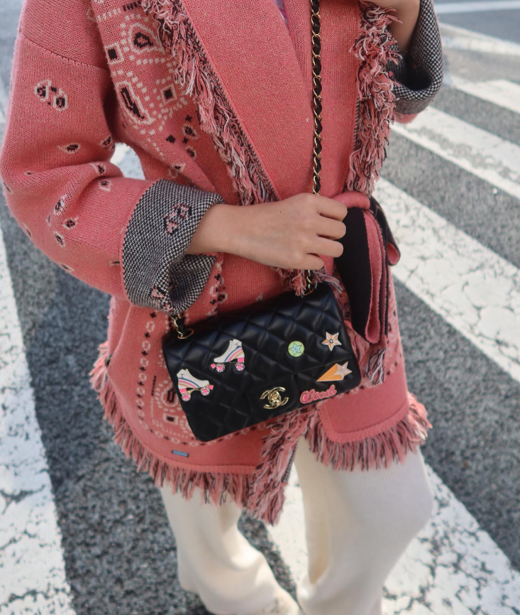 Pink bandanna Alanui Cardigan worn with Chanel Mini bag